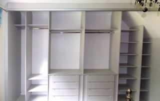 wardrobe interior fitted into a reduced height sloping loft conversion