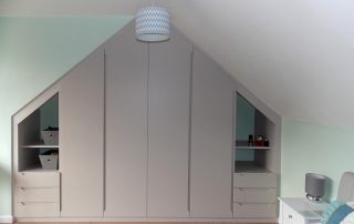 sliding door wardrobe in loft conversion