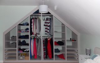 sliding door wardrobe open in loft conversion