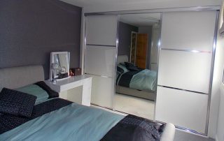 white mirrored aluminium sliding wardrobe door