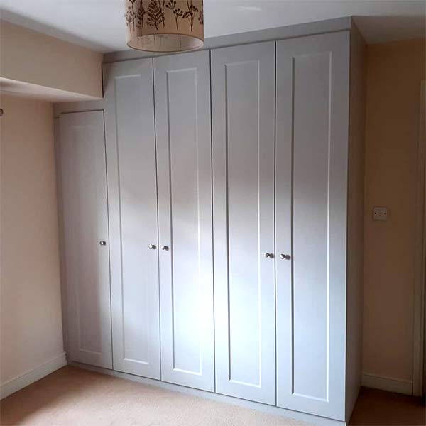 light-grey fitted hinged wardrobe front view