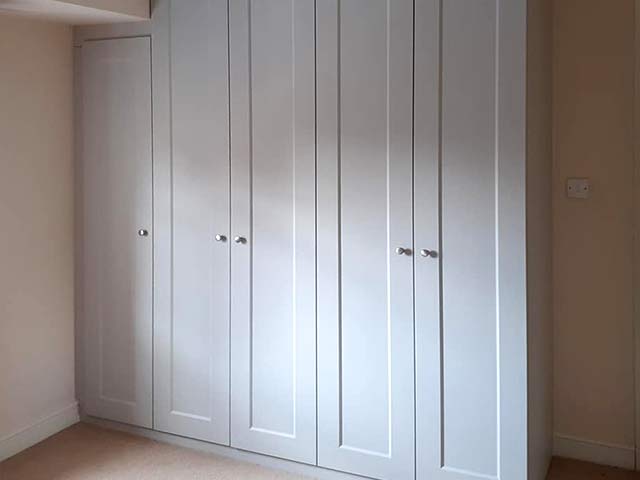 light-grey hinged wardrobe featured