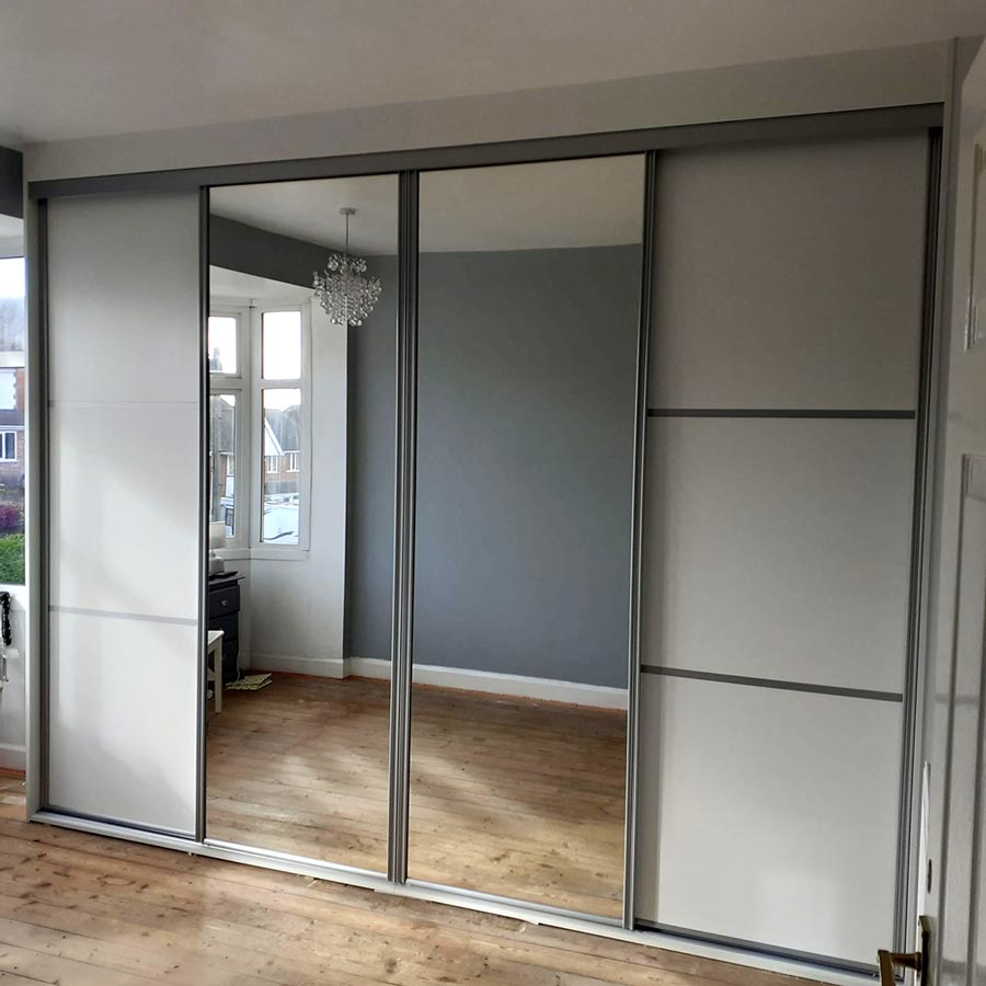 quad-wardrobe-white-panels-aluminium-trim-double-central-mirror-doors